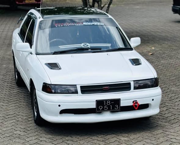 Mazda Familia 323 (1992) – Well‑maintained, New Paint, Full Docs